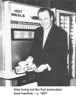 Stan using the first automatic food machine